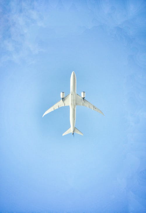 Free stock photo of airplane, blue, blue sky Stock Photo