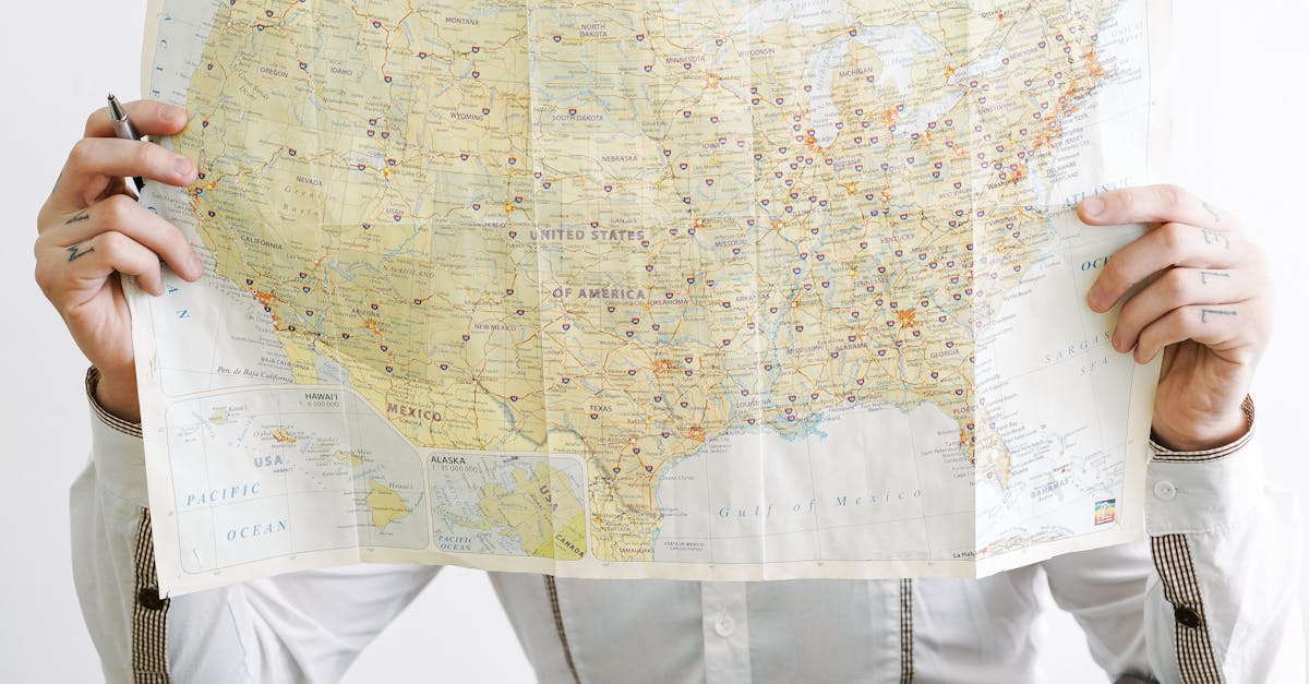 Person Holding Map · Free Stock Photo