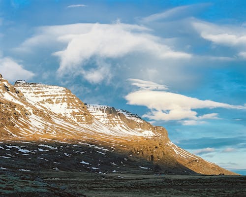 Brown and White Mountain Under White Clouds
