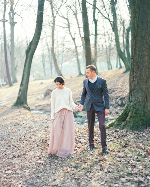 Couple on a Walk in Autumn Park