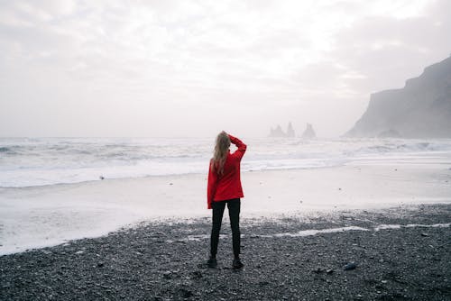Free Fog over Sea Shore with Woman Stock Photo