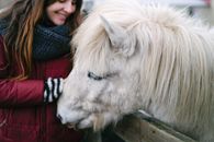 Woman in Jacket with Animal