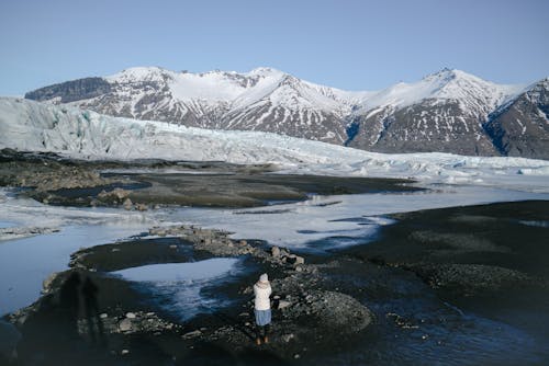 Woman Looking at Glacier