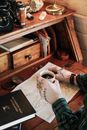Person Working at Vintage Desk