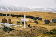 White Cross on Green Grass Field