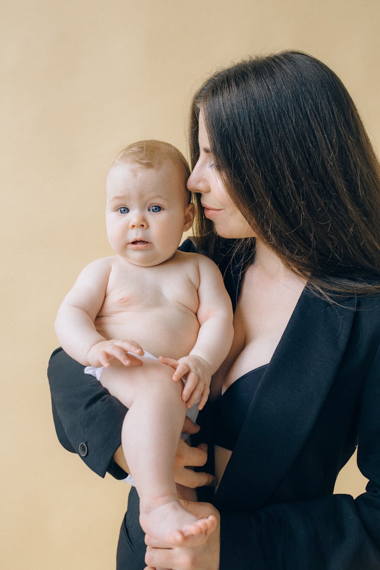 Portrait Of Woman Holding Her Baby