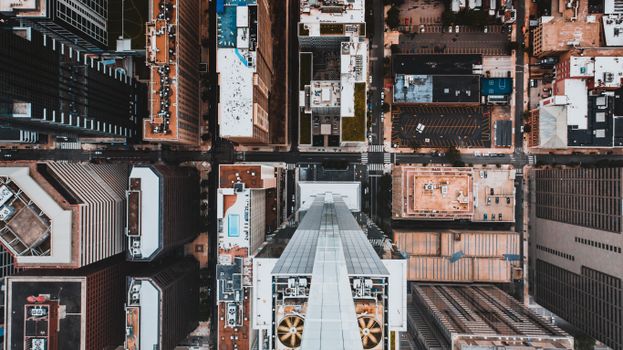 Aerial view of houses for living and high towers of housing complex in city