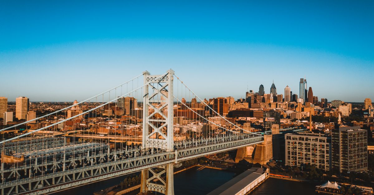 Drone view of city landmark Benjamin Franklin Bridge over Delaware River connecting cities of Philadelphia in America