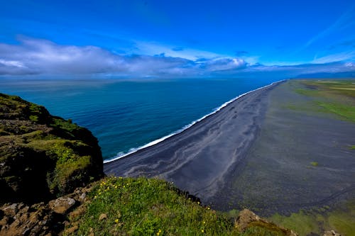 Body of Water Near Mountain