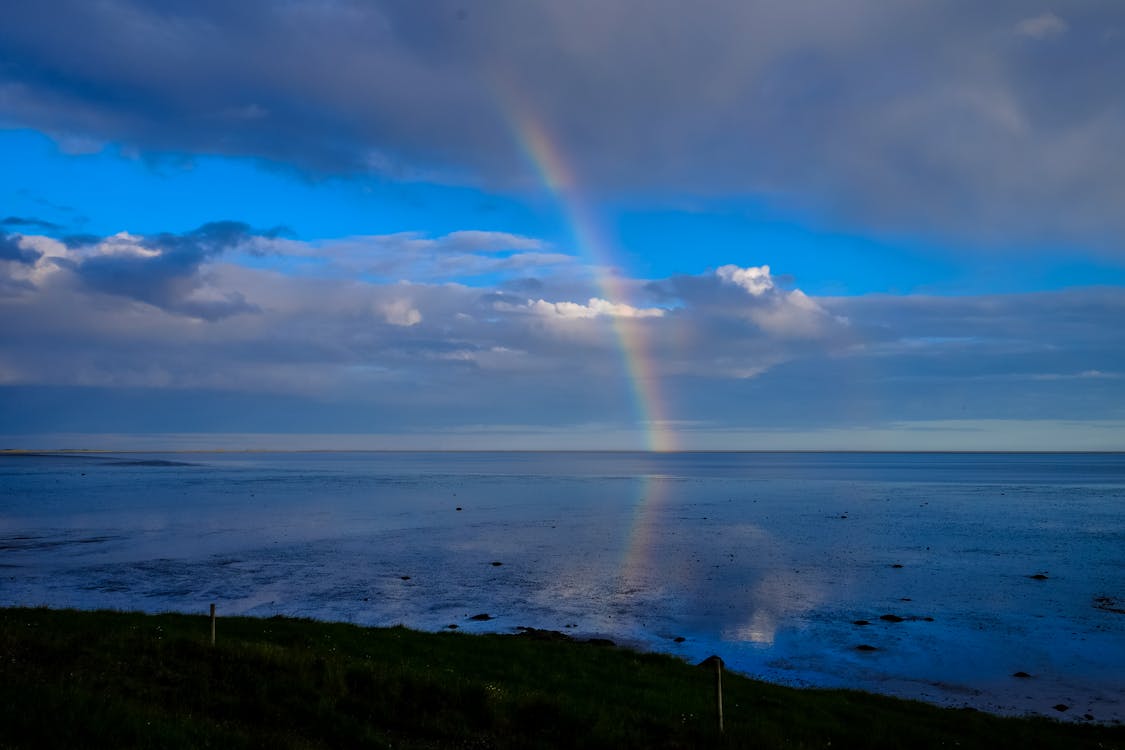 Free Photo of Rainbow over Horizon Stock Photo