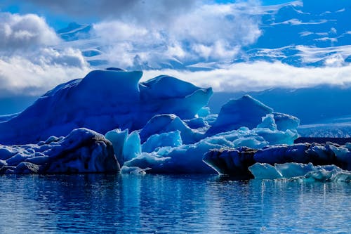 Glacier Under Cloudy Sky