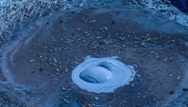 Close-up Photo of Blue Paint Bubble on Body of Water
