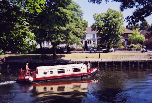 Red and White Boat on River