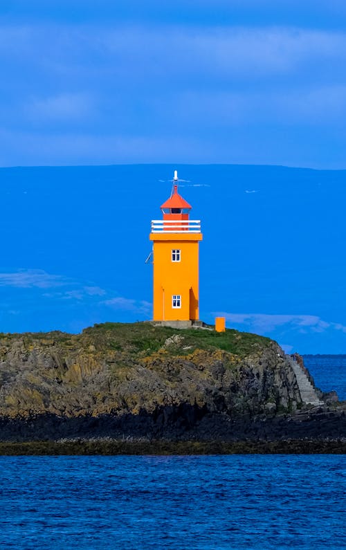 Lighthouse Near Body of Water