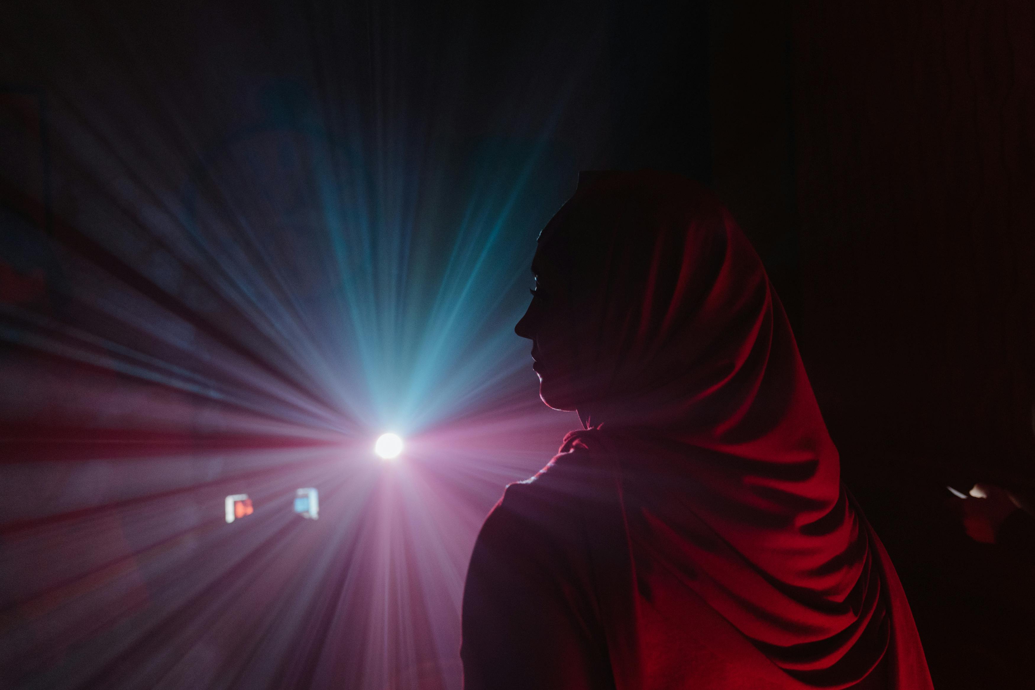 Person in Red Hoodie Standing · Free Stock Photo