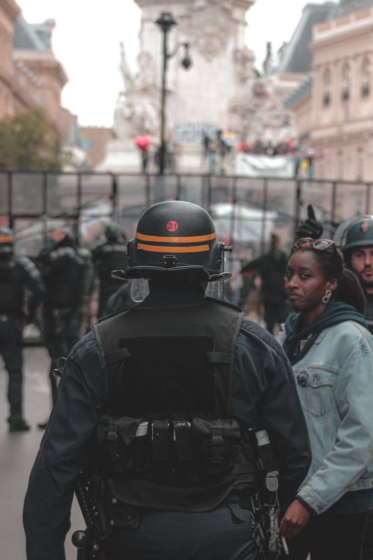 Armed Police Officer During Protest Meeting