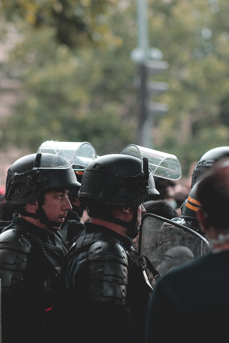 Police Squad In Helmets Waiting For Order