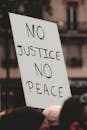 People protesting with handmade sign