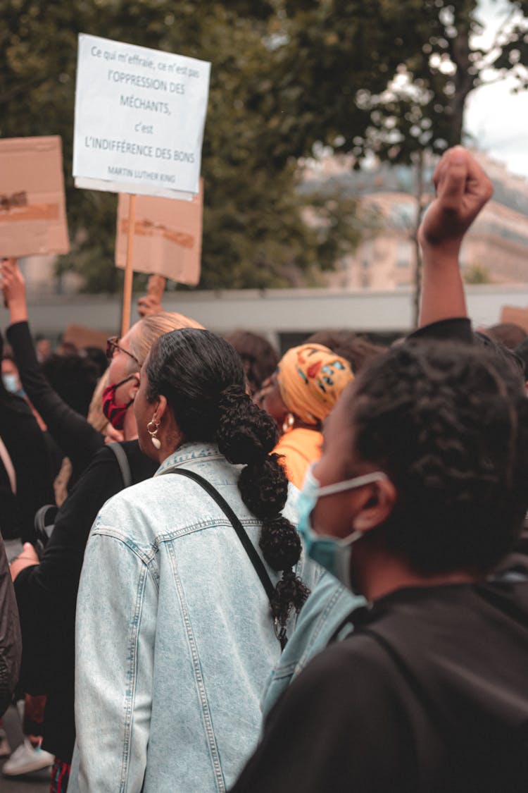 Ethnic People With Hand Written Posters In Protest