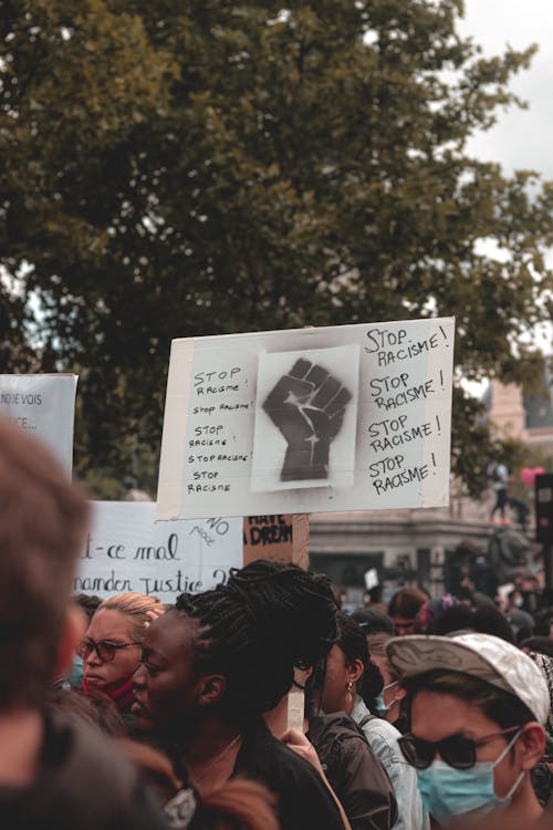 Crowd protesting against racism in city