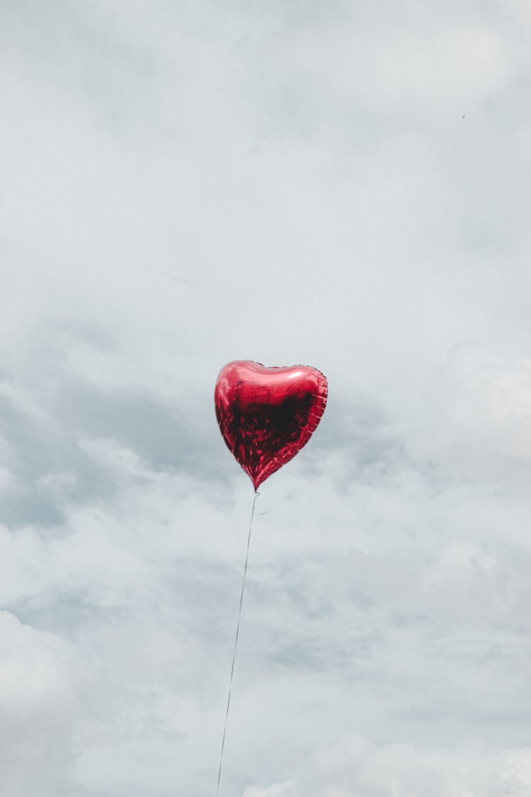 Red Heart Balloon In Sky