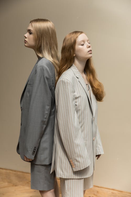 Redhead and Blonde Models in Suits