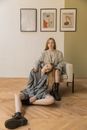 Couple in Room with Paintings