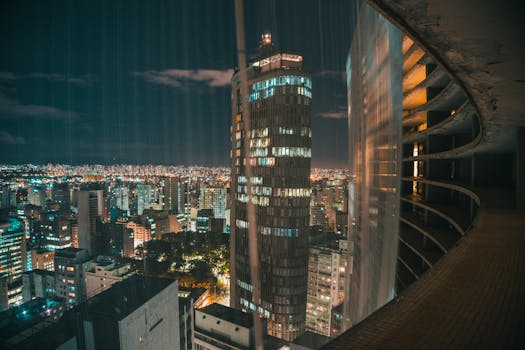Illuminated São Paulo skyline captured at night showcasing vibrant urban life.