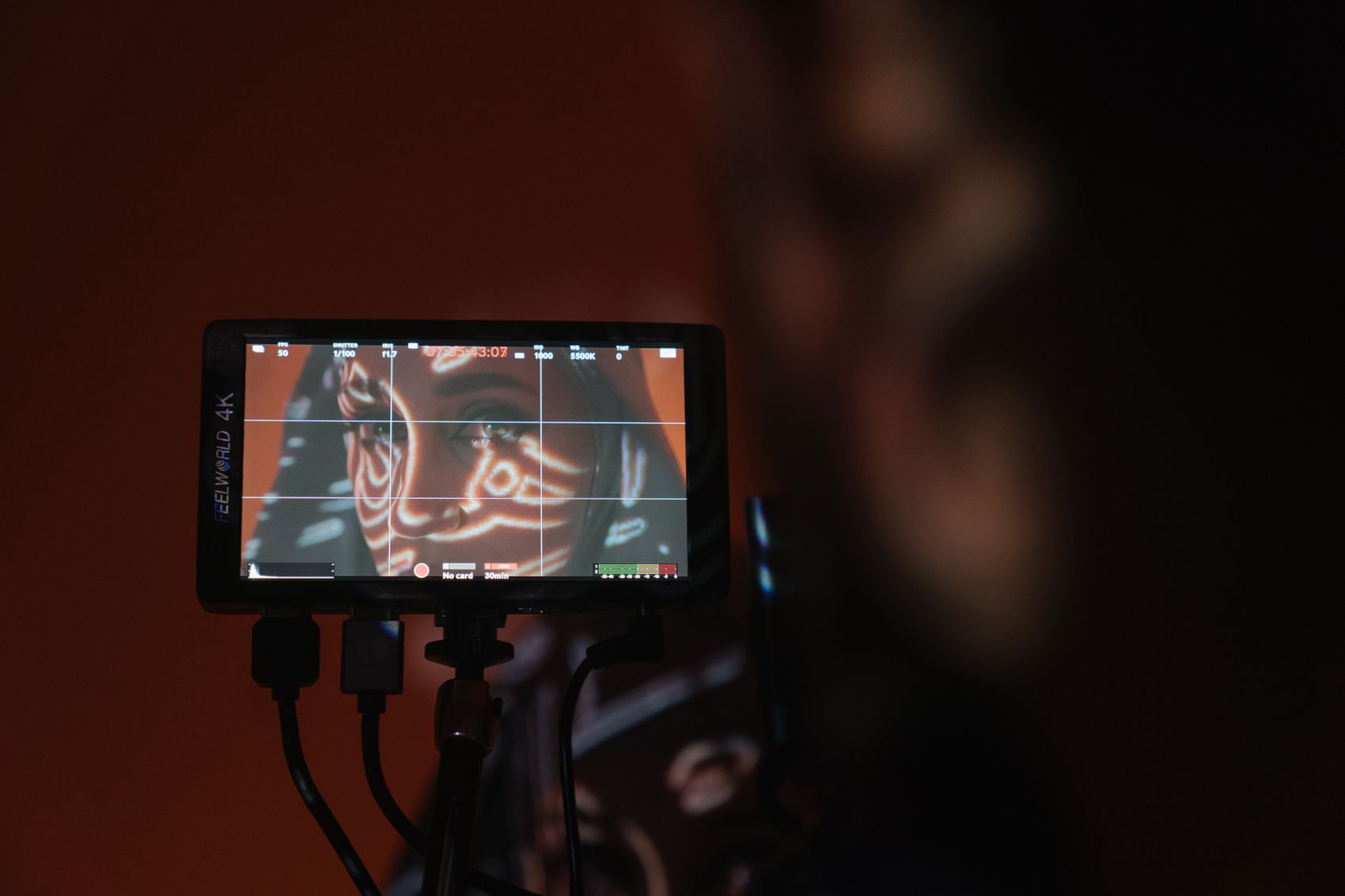 Premium smart television displaying IPTV content in a dark room