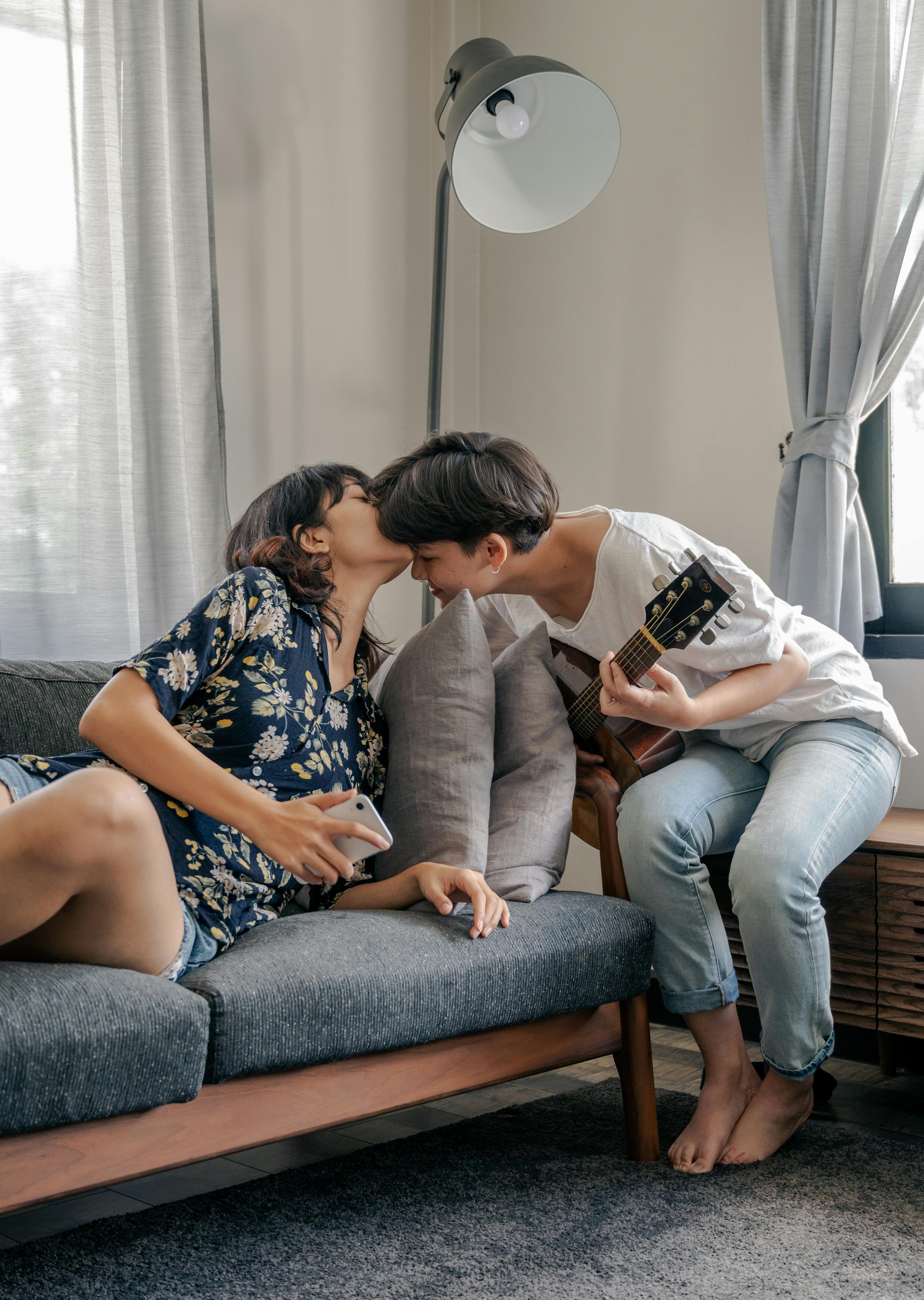 Couple Kissing in Room · Free Stock Photo