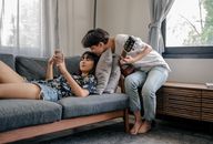 Woman With Smartphone and Woman With Guitar