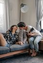 Two Women on Sofa