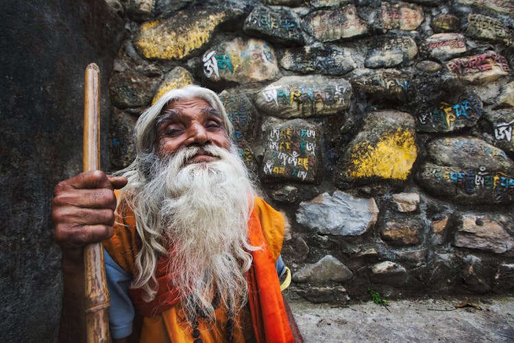 Elderly Ethnic Man With Cane