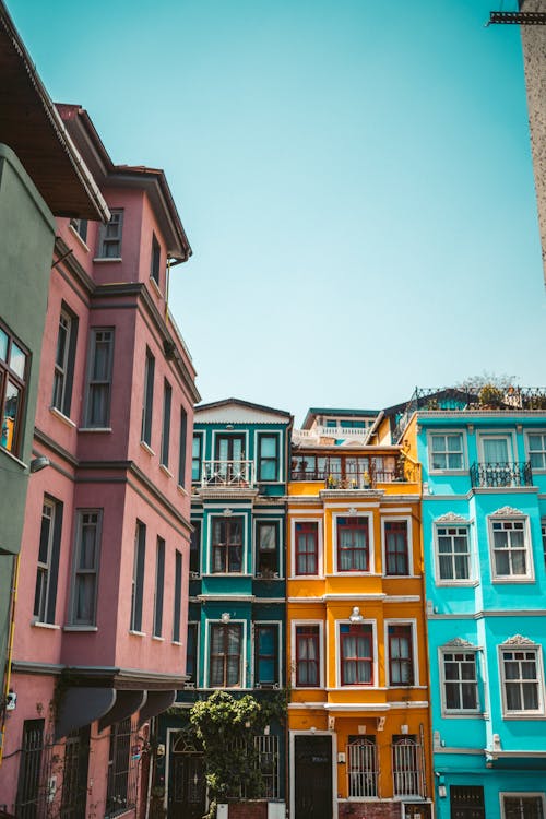 Free Photo of Colorful Buildings Under Blue Sky Stock Photo