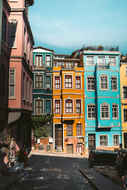 Free Photo of Colorful Buildings Under Blue Sky Stock Photo