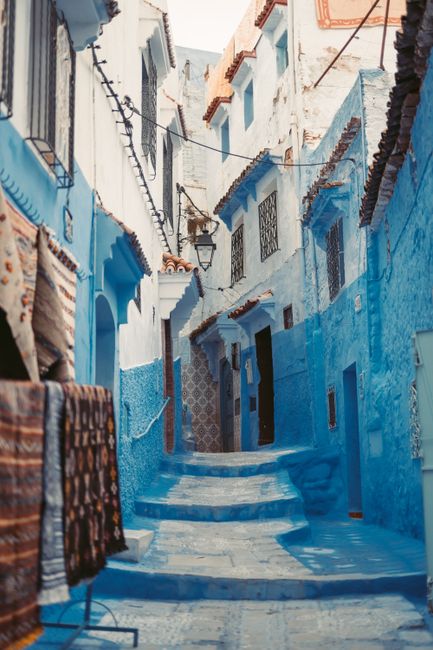 Explore the vibrant blue streets of Chefchaouen, Morocco's scenic medina.