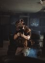 Photo of Man Holding Black Rifle