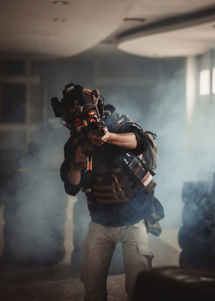 Photo Of Man Holding Black Rifle