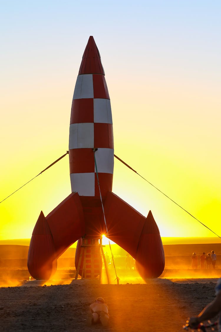 Model Spacecraft Illuminated By Setting Sun At Burning Man Festival