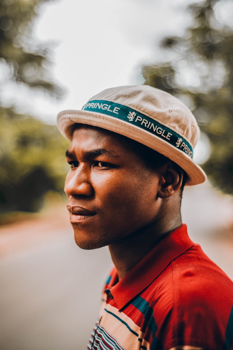 Black Confident Man In Hat On Street