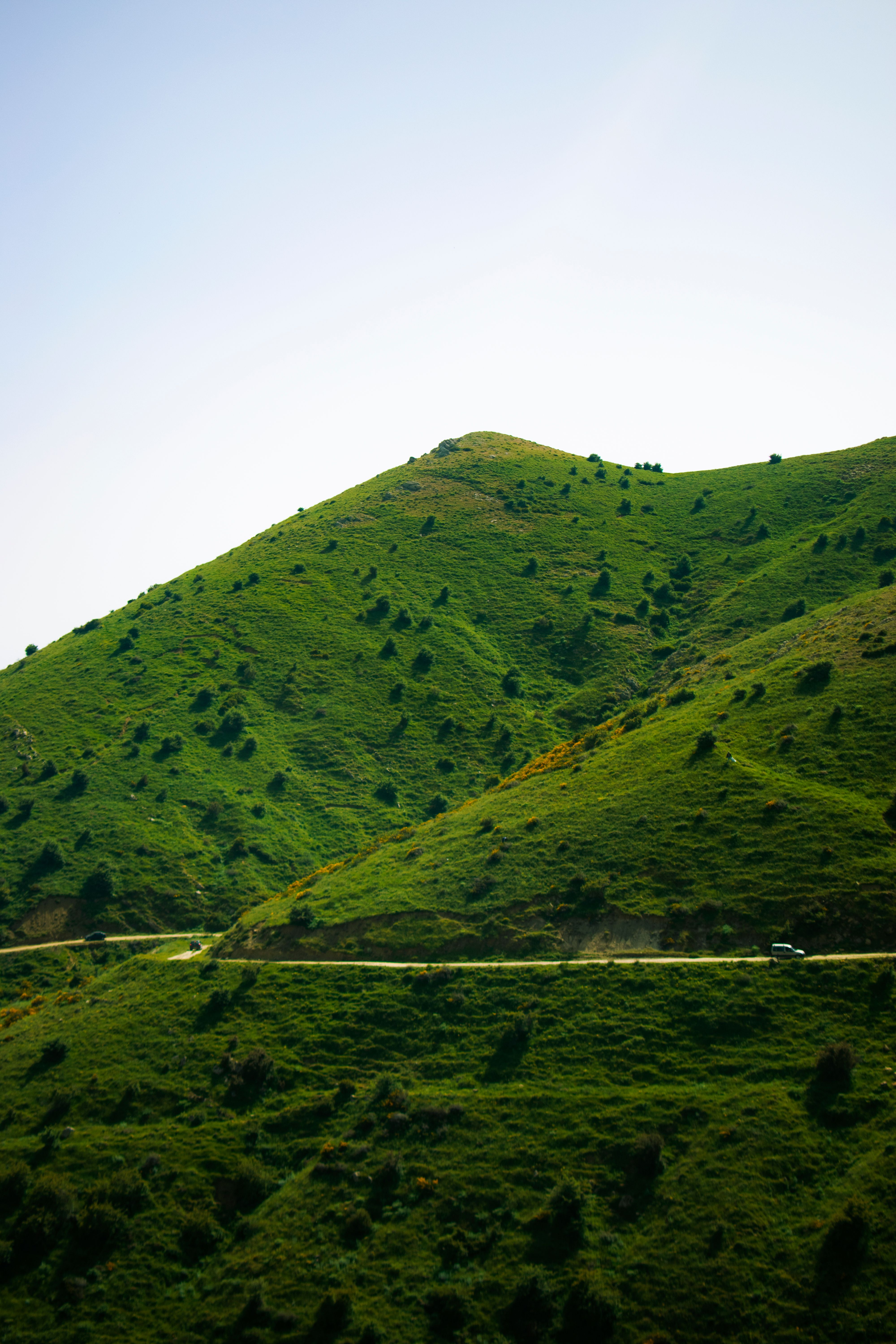 Green Mountain Under the White Sky · Free Stock Photo
