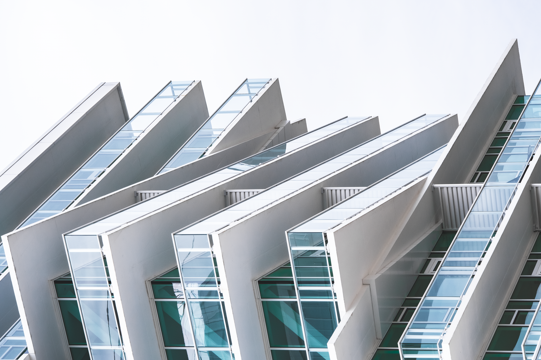 A sophisticated minimalist architectural view representing global strategic connectivity and market transition in the luxury sector.