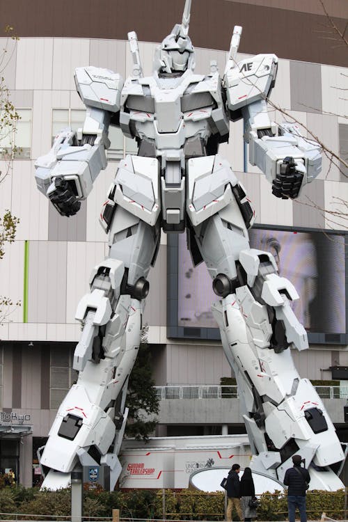 Large Gray Robot Standing Near Building
