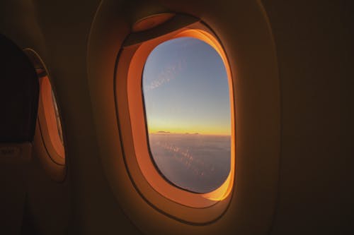 Ilmainen kuvapankkikuva tunnisteilla auringonvalo, ikkunanäkymä, lentokone Kuvapankkikuva