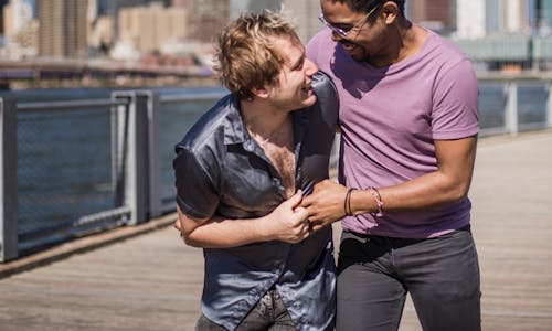 Free Two Happy Men Looking at Each Other Stock Photo