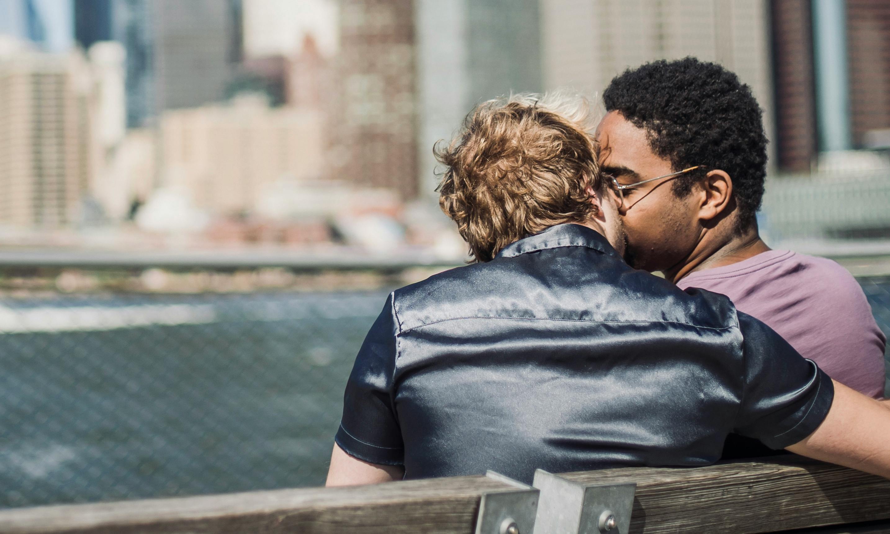 couple kissing outside