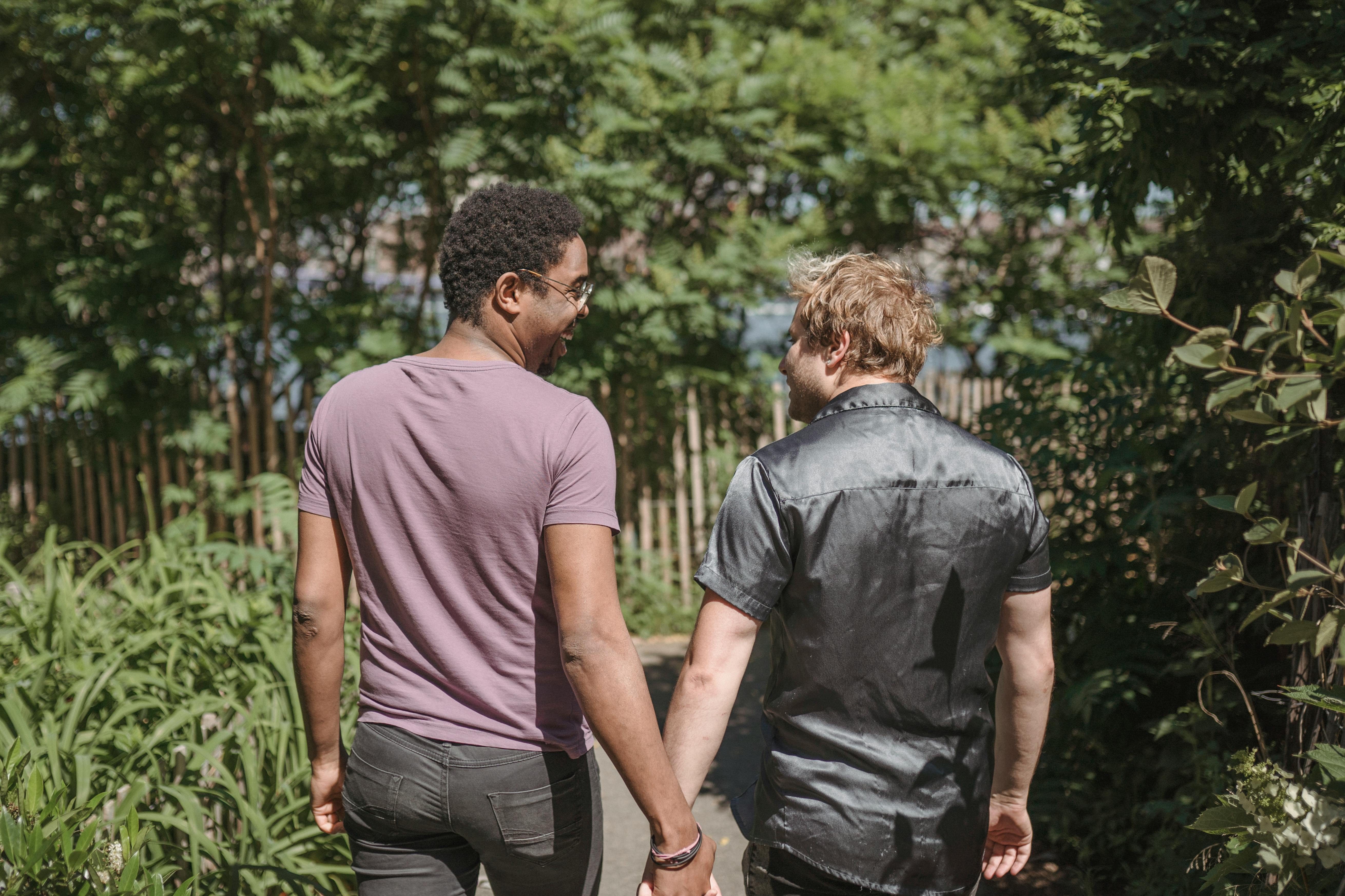 Two Men Holding Hands · Free Stock Photo