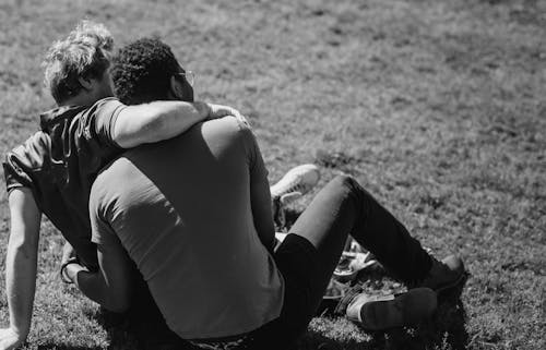 Couple Sitting Together on the Ground