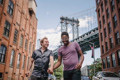 Free Two Men Holding Hands Stock Photo