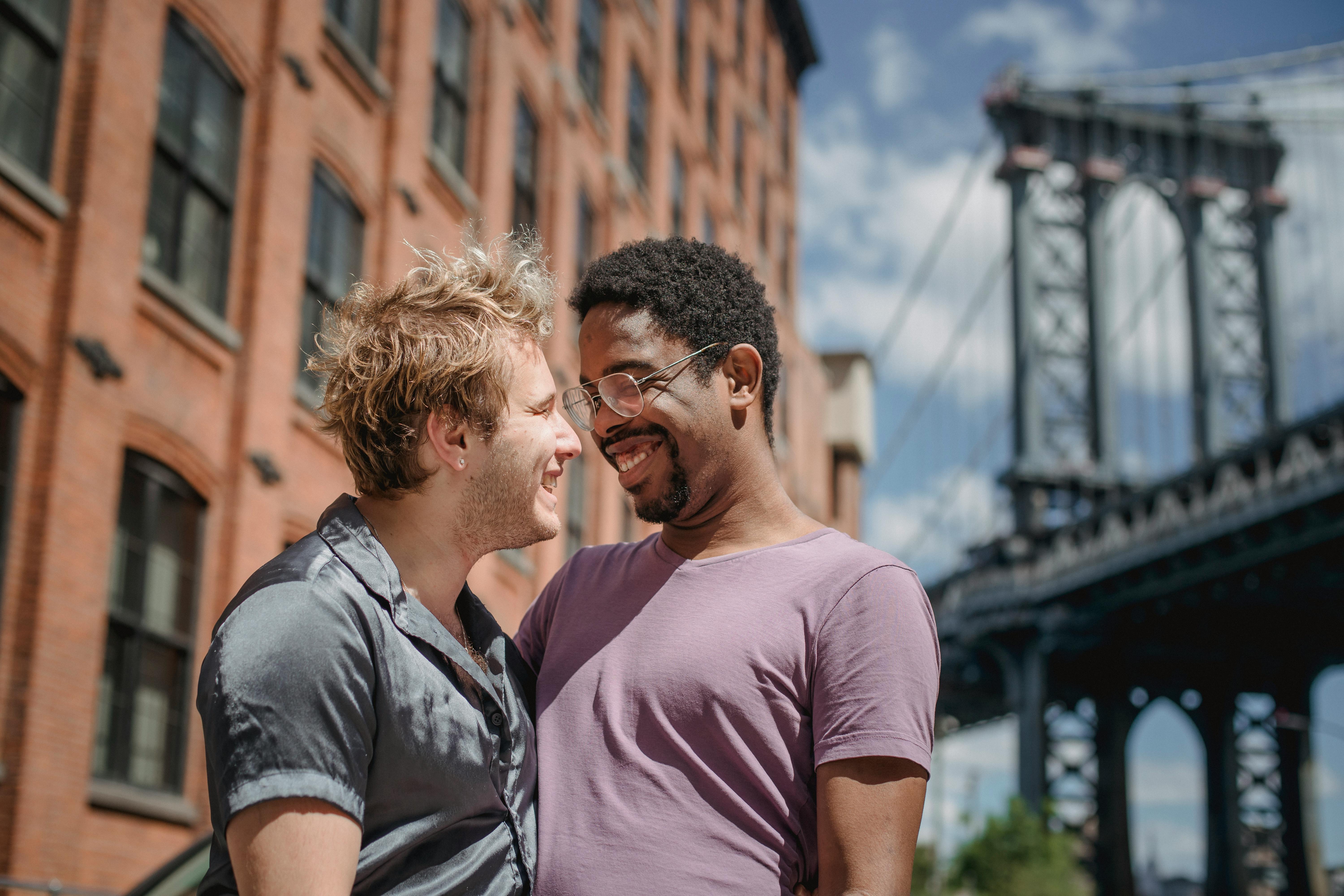 happy men looking at each other